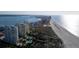 Aerial view of beachfront high-rise building and beach at 1200 Gulf Blvd # 206, Clearwater, FL 33767