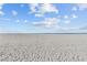 Expansive beachfront view with footprints in the sand at 1200 Gulf Blvd # 206, Clearwater Beach, FL 33767