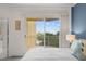 Bedroom with ocean view and ensuite bathroom at 1200 Gulf Blvd # 206, Clearwater, FL 33767