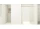 View of a modern, white tiled shower with a white shower curtain at 15129 Rainbow Quartz St, Wimauma, FL 33598