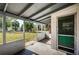 Screened porch with a view of the backyard at 1536 77Th N Ave, St Petersburg, FL 33702