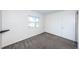 Unfurnished bedroom featuring gray carpeting and a single window at 1536 77Th N Ave, St Petersburg, FL 33702