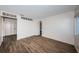 Bright living room with wood-look tile flooring and white walls at 1536 77Th N Ave, St Petersburg, FL 33702