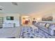 Open concept living room with views of dining area and kitchen at 2003 Halmrock Pl, Sun City Center, FL 33573