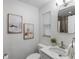 Modern bathroom with updated vanity, fixtures, and decorative accents at 2461 61St N Ln, St Petersburg, FL 33710