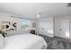 Spacious bedroom with ample natural light, a ceiling fan, and carpeted floors at 2461 61St N Ln, St Petersburg, FL 33710