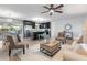 Spacious living room with comfortable seating, stylish decor, and an open view to the kitchen at 2461 61St N Ln, St Petersburg, FL 33710