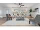 Bright living room with large windows, a comfortable couch, and modern decor at 2461 61St N Ln, St Petersburg, FL 33710