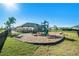 playground area with modern play equipment and safe, cushioned ground cover at 37868 Beacon Brick Dr, Zephyrhills, FL 33540