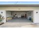 Spacious and well-organized two-car garage featuring ample storage, epoxy flooring, and convenient access at 5101 Huntington Ne Cir, St Petersburg, FL 33703