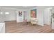 Spacious living room featuring neutral paint, stylish decor, and new flooring at 5101 Huntington Ne Cir, St Petersburg, FL 33703