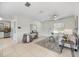 Bright and airy living room with tile floors and a neutral color scheme at 704 N Castle Ct, Tampa, FL 33612