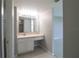 Bright bathroom featuring a vanity with ample counter space and a well-lit mirror at 7400 Sun Island Dr # 501, South Pasadena, FL 33707