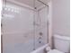 Clean bathroom features a shower with glass door, and a white tiled surround at 7400 Sun Island Dr # 501, South Pasadena, FL 33707