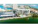 Exterior shot of a waterfront high-rise with convenient parking and a pool at 7400 Sun Island Dr # 501, South Pasadena, FL 33707