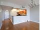 Inviting kitchen featuring wood cabinetry, granite countertops, and a breakfast bar perfect for casual dining at 7400 Sun Island Dr # 501, South Pasadena, FL 33707