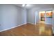 Bright, open living room with hardwood floors leading to the kitchen at 7400 Sun Island Dr # 501, South Pasadena, FL 33707