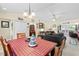 Dining area with a red and black checkered tablecloth at 7497 Heather Walk Dr, Weeki Wachee, FL 34613