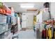Laundry room with washer, dryer, and ample storage at 7497 Heather Walk Dr, Weeki Wachee, FL 34613