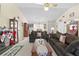 Living room with fireplace and comfortable seating at 7497 Heather Walk Dr, Weeki Wachee, FL 34613