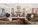 Living room with a fireplace and comfortable seating at 7497 Heather Walk Dr, Weeki Wachee, FL 34613