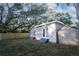 Updated house exterior and storage shed in backyard at 8092 27Th N Ave, St Petersburg, FL 33710