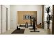 Spacious home gym featuring an exercise bike, free weights, large wall mirror, and potted plant at 9698 Runaway Breeze Dr, Land O Lakes, FL 34637