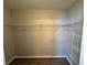 Walk-in closet with wire shelving for organized storage at 1333 Misty Greens Dr, Sun City Center, FL 33573