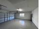Two-car garage with an automatic door opener at 1333 Misty Greens Dr, Sun City Center, FL 33573