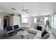 Inviting living room with modern furnishings and ample natural light at 1333 Misty Greens Dr, Sun City Center, FL 33573