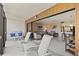 Spacious balcony with seating, offering access to living area and scenic views at 1700 Cove Ii Pl # 310, Sarasota, FL 34242