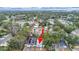 An aerial view of the home and surrounding neighborhood at 1708 E Poinsettia Ave, Tampa, FL 33612