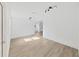 Bright living room with wood-look flooring and recessed lighting at 1708 E Poinsettia Ave, Tampa, FL 33612
