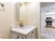 Bathroom with vanity, single sink, and view of kitchen at 20002 Gulf Blvd # 2604, Indian Shores, FL 33785