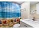 Clean bathroom with white vanity and shower at 20002 Gulf Blvd # 2604, Indian Shores, FL 33785
