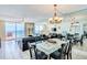 Ocean view dining room with glass table and seating for four at 20002 Gulf Blvd # 2604, Indian Shores, FL 33785