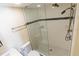 Large walk-in shower with glass enclosure and tile at 20002 Gulf Blvd # 2604, Indian Shores, FL 33785