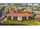 Aerial view of the community with red tile roofs and landscaping at 2400 Feather Sound Dr # 515, Clearwater, FL 33762