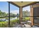 Balcony with peaceful views of a pond and lush greenery at 2400 Feather Sound Dr # 515, Clearwater, FL 33762