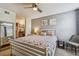 Cozy bedroom with a comfortable bed and ensuite bathroom access at 2400 Feather Sound Dr # 515, Clearwater, FL 33762