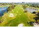 Aerial view of golf course with lush fairways, water features, and sand traps at 2400 Feather Sound Dr # 515, Clearwater, FL 33762