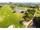Scenic golf course with water features, trees, and sand traps at 2400 Feather Sound Dr # 515, Clearwater, FL 33762