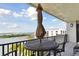 Enjoy panoramic water views from this inviting balcony with patio furniture at 4 Belleview Blvd # 801, Belleair, FL 33756