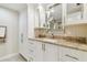 Modern bathroom with granite vanity, updated fixtures, and ample storage at 4 Belleview Blvd # 801, Belleair, FL 33756