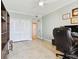 Home office with tiled floors, built-in cabinets, and ample natural light at 4 Belleview Blvd # 801, Belleair, FL 33756