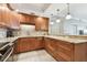 Modern kitchen featuring granite countertops, ample cabinetry, and stainless steel appliances at 4 Belleview Blvd # 801, Belleair, FL 33756