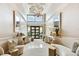 Elegant lobby with high ceilings, stylish seating area, and double doors leading to another area at 4 Belleview Blvd # 801, Belleair, FL 33756