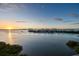 Sunrise over the ocean with coastal homes in view at 4 Belleview Blvd # 801, Belleair, FL 33756