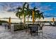 Relaxing patio area with waterfront views and comfortable seating at 4 Belleview Blvd # 801, Belleair, FL 33756