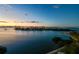 Picturesque sunset view over the water and island at 4 Belleview Blvd # 801, Belleair, FL 33756